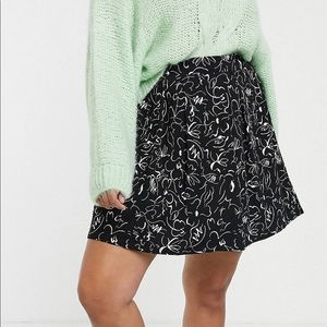 Mono print box pleated skirt